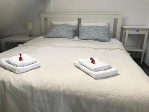 Кровать или кровати в номере Centrum