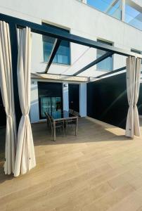 Balkón alebo terasa v ubytovaní Tríplex Cruz del Mar Beach, Apartamentos Living Sur