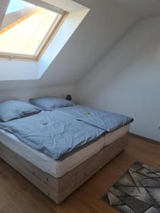 Postel nebo postele na pokoji v ubytování Stadtloft