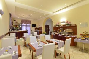 Posezení v ubytování Hotel Rosignano