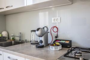 Kuchyňa alebo kuchynka v ubytovaní Apartman BeBe