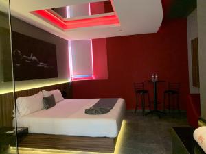 Postel nebo postele na pokoji v ubytování Roxy Motel