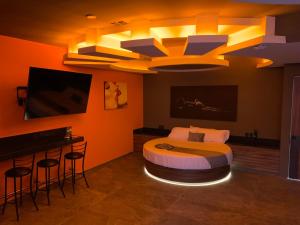 TV a/nebo společenská místnost v ubytování Roxy Motel + 11 fotografií