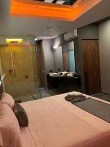 Postel nebo postele na pokoji v ubytování Roxy Motel