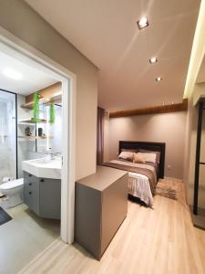 Llit o llits en una habitació de Apartamento ao lado da Vila Germânica