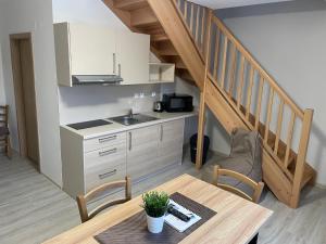 Kuchyň nebo kuchyňský kout v ubytování Apartmány Na Výsluní Dolní Morava