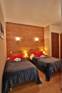 Postel nebo postele na pokoji v ubytování Hôtel Restaurant Gîtes Les 5 Saisons