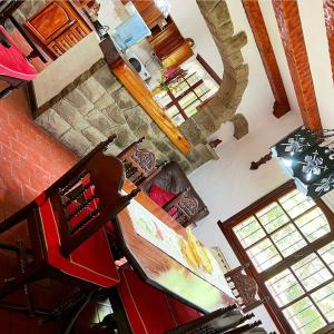 an overhead view of a living room with a guitar at Ruca Quimei Malek in San Carlos de Bariloche