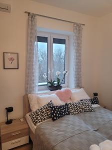 Posteľ alebo postele v izbe v ubytovaní Rosé Apartment