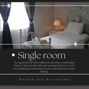 Postel nebo postele na pokoji v ubytování Citalna Rooms