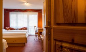 Postel nebo postele na pokoji v ubytování Walliserhof