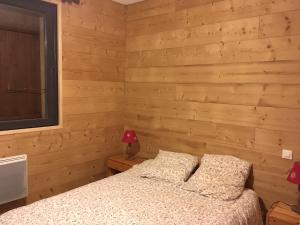 Postel nebo postele na pokoji v ubytování L'appart du Chalet