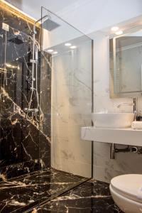 Koupelna v ubytování Arxontiko Hotel + 37 fotografií