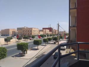 a view of a street from a balcony of a building at Appartement à louer Tiznit 1 in Tiznit