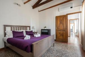 Posteľ alebo postele v izbe v ubytovaní Ca' Giorgia Venice Apartment with Balcony