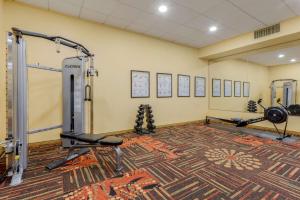 a fitness room with a gym with tread machines at Best Western Red Hills in Kanab