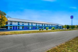 a blue and white building on the side of a road at Motel 6 Jeffersonville, IN in Jeffersonville