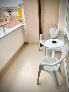 A balcony or terrace at Art Apartment for 4 People Free Parking & Wifi