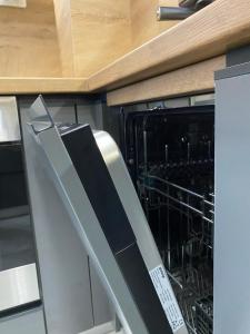 A kitchen or kitchenette at Art Apartment for 4 People Free Parking & Wifi