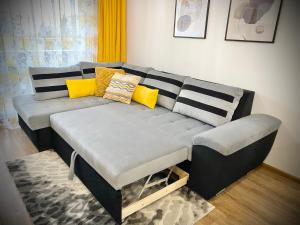 A bed or beds in a room at Art Apartment for 4 People Free Parking & Wifi