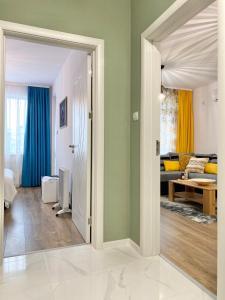 A bed or beds in a room at Art Apartment for 4 People Free Parking & Wifi