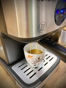 Coffee and tea making facilities at Art Apartment for 4 People Free Parking & Wifi