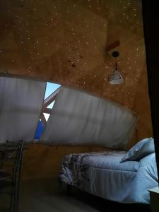 Postel nebo postele na pokoji v ubytování Domos Trayenko