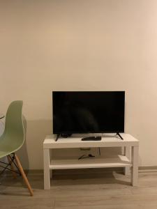 Televízia a/alebo spoločenská miestnosť v ubytovaní Departamento ideal para viajeros, zona turística