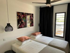 Ένα ή περισσότερα κρεβάτια σε δωμάτιο στο Belnem Garden Residence +7 φωτογραφίες