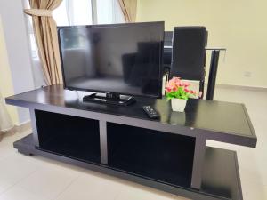 TV a/nebo společenská místnost v ubytování JoJo Homestay Tiara Residence