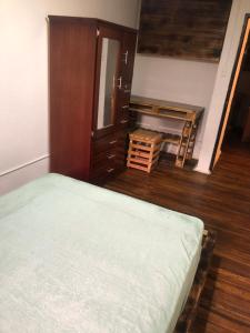 Cama o camas de una habitación en 福音背包客旅馆