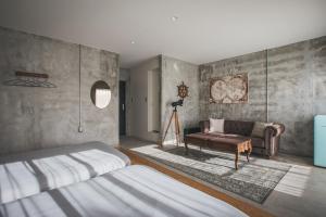 Postel nebo postele na pokoji v ubytování Yanbaru Hostel