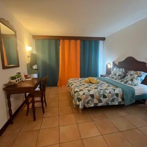 Letto o letti in una camera di Studio La «KAZ’ À COCO» Anse Caritan
