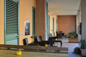 Posezení v ubytování Hotel Rosignano