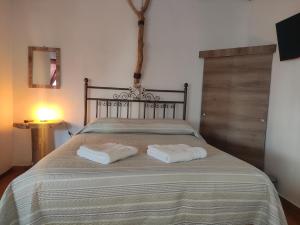 Voodi või voodid majutusasutuse Pirca Hostal toas