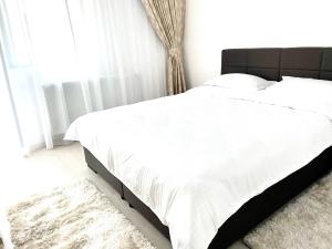 Una cama o camas en una habitación de Luxury apartments
