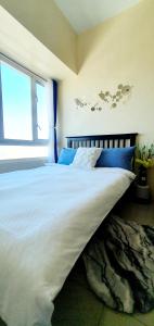 Postel nebo postele na pokoji v ubytování Sea-Sky Perch Suite + 5 fotografií