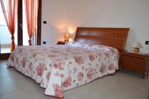 A bed or beds in a room at il Terrazzo del Sole