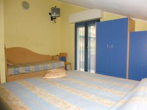 Postel nebo postele na pokoji v ubytování Hotel Basilea