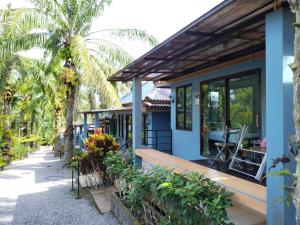 Fotografie z fotogalerie ubytování Palm Tian Homes A17 v destinaci Ban Chong Phli