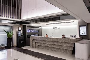 Hub Hotel - Songshan Airport Branchのロビーまたはフロント