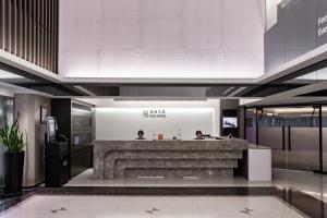 Hub Hotel - Songshan Airport Branchのロビーまたはフロント