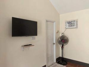 TV a/nebo společenská místnost v ubytování Miguel's Homestay + 13 fotografií