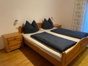 Postel nebo postele na pokoji v ubytování Haus St. Martin