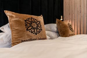 Posteľ alebo postele v izbe v ubytovaní Aparthotel Zakopane