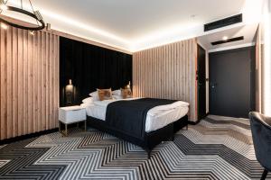 Posteľ alebo postele v izbe v ubytovaní Aparthotel Zakopane