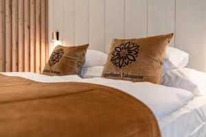 Posteľ alebo postele v izbe v ubytovaní Aparthotel Zakopane
