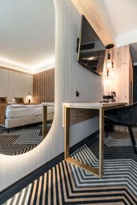 Posteľ alebo postele v izbe v ubytovaní Aparthotel Zakopane
