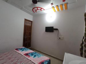 Ένα ή περισσότερα κρεβάτια σε δωμάτιο στο Hotel Ayodhya Palace +3 φωτογραφίες