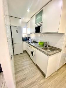 Kuchyň nebo kuchyňský kout v ubytování Iris Vistas Benalmadena